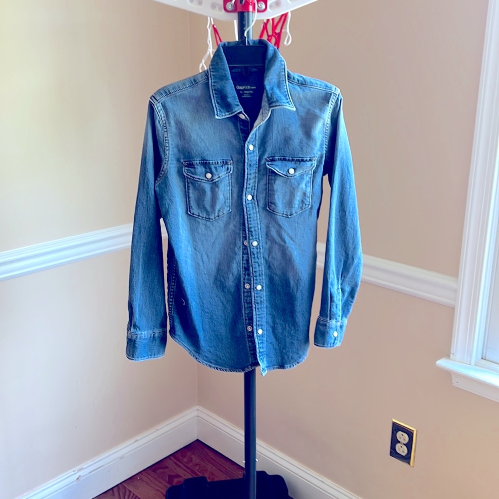 Denim button up long sleeve shirt.